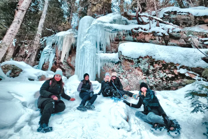 a group of people that are standing in the snow