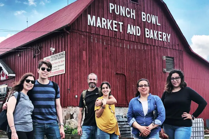 a group of people standing in front of a building