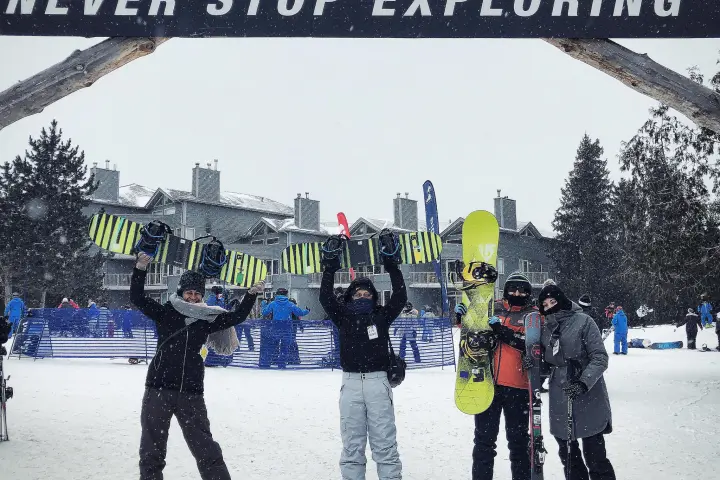 a group of people that are standing in the snow