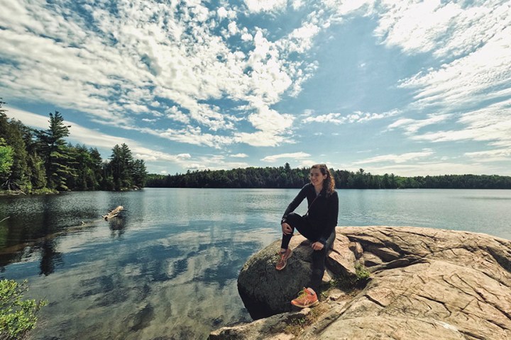 a man that is standing in the water