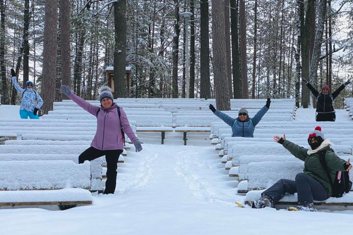 a person jumping up in the snow