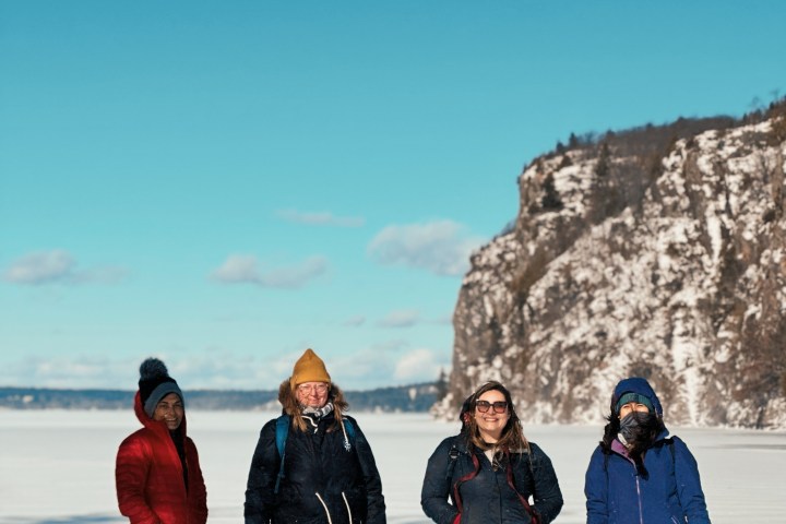 a group of people that are standing in the snow