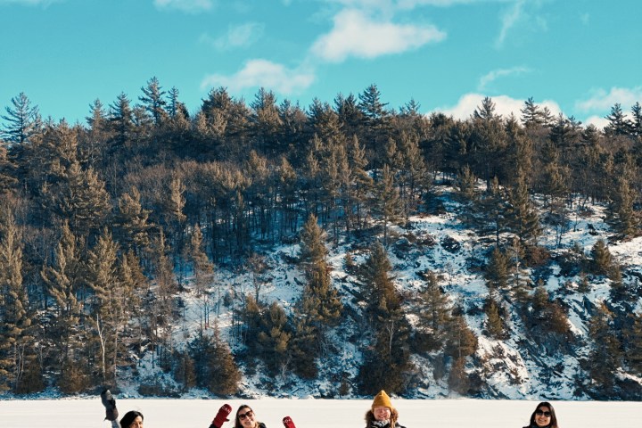 a group of people cross country skiing in the snow