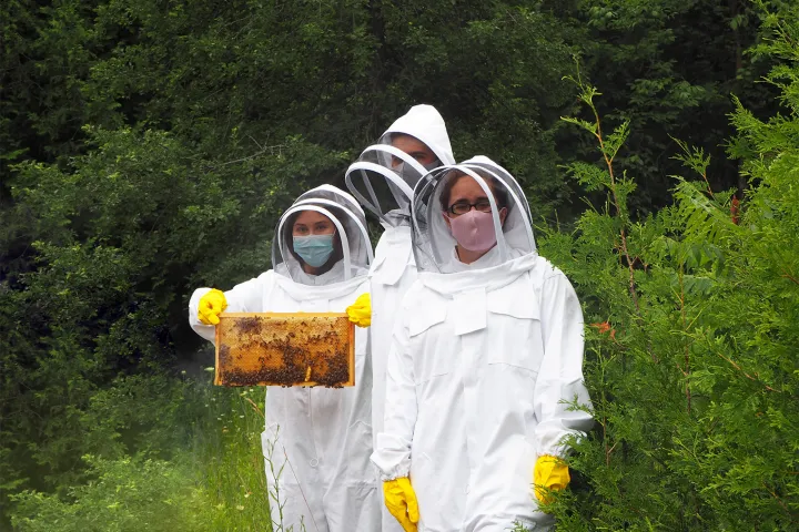 a man standing next to a hydrant