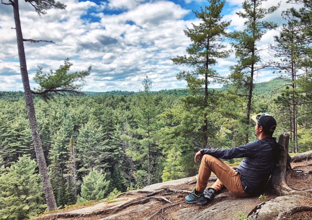 126465A9-FA9E-4DB6-8DAC-F82EDD842791_1_105_c a man sitting on a rock