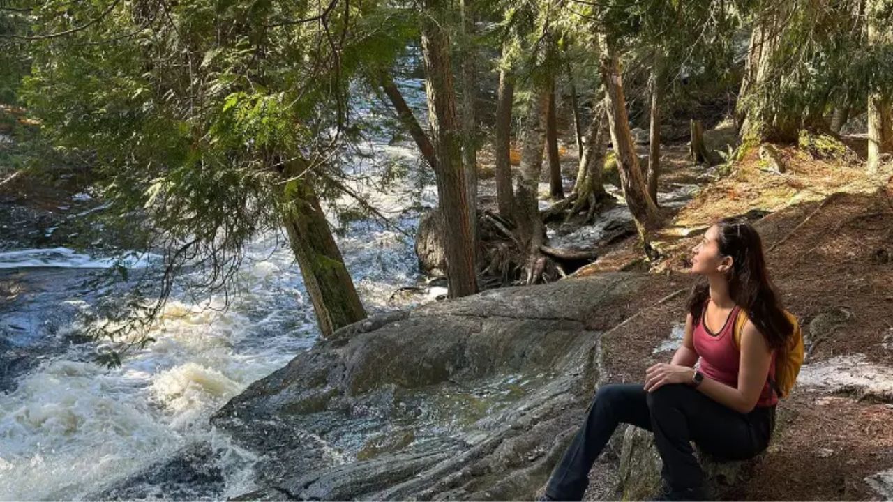 A hiker with a backpack standing at Algonquin Provincial Park