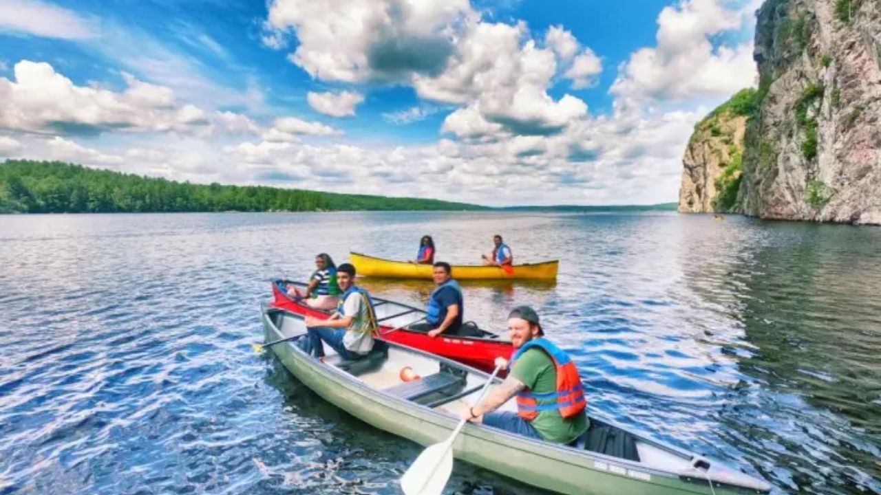 Canoeing adventure in Toronto with Toronto Eco Adventures with cliffs and clear blue water