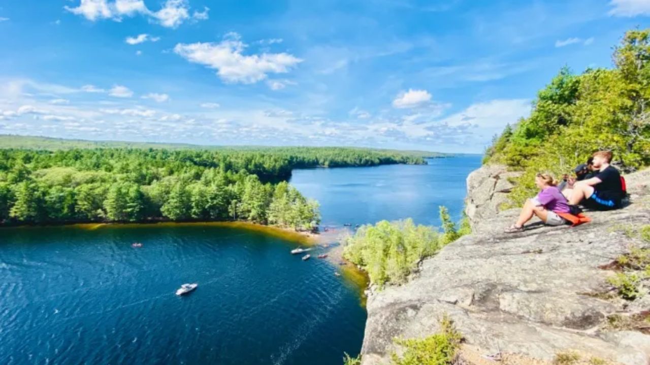 Hikers enjoying panoramic viewpoint