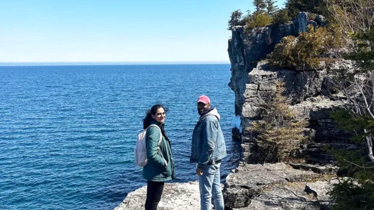 Hiking viewpoint in Tobermory with ocean-like blue water views